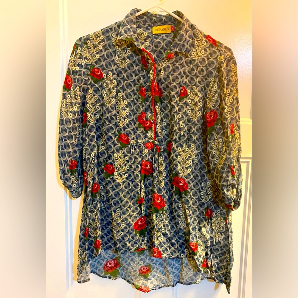 BENARES Lovely blue blouse with red flowers and detail piping.
